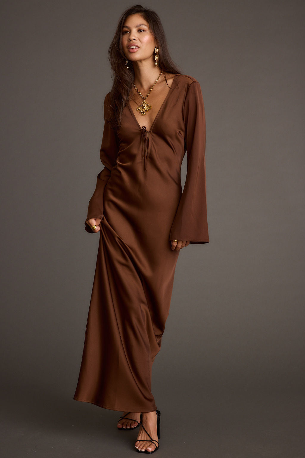 Back view of the mocha satin maxi dress showing the silhouette and fit.
