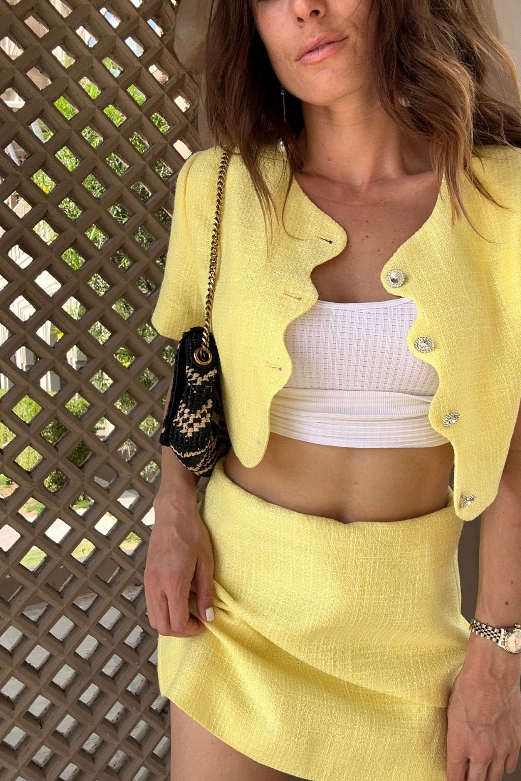Detail shot of the Sunday Yellow Cropped Jacket highlighting the cropped elements.