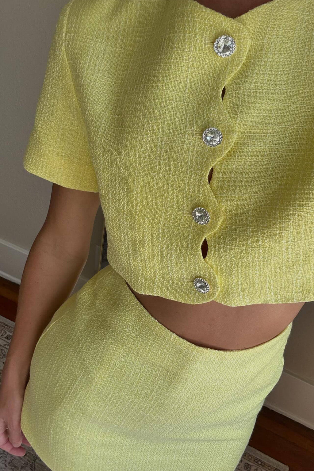 Sunday Yellow Mini Skirt styled in a complete look from an alternate angle.