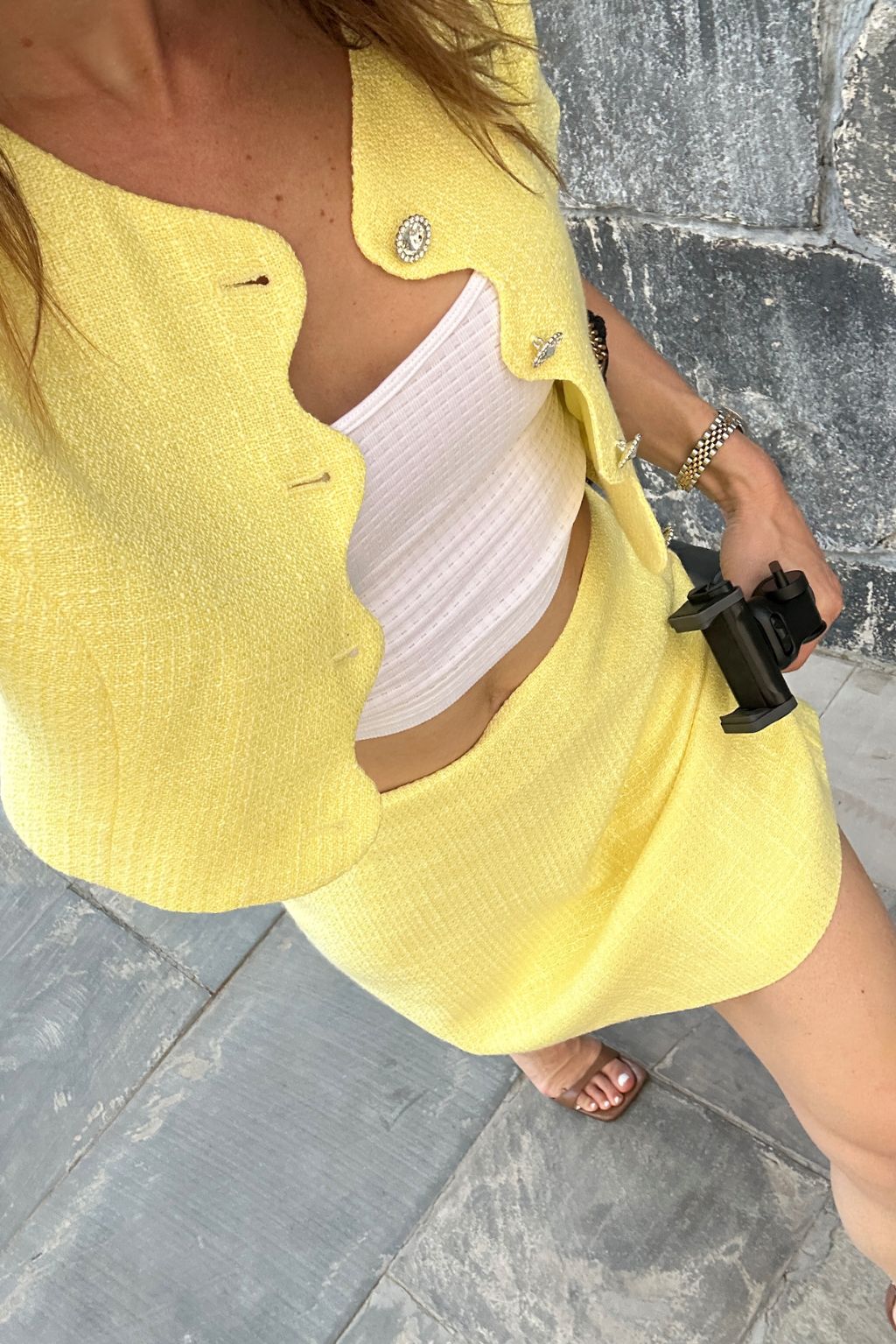 Alternate angle of the yellow jacket highlighting the overall design.