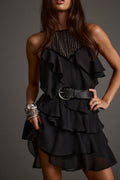 Black mini dress with elegant accents, a black studded dress essential.