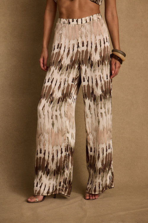 Satin pants with refined detailing and a flattering silhouette.