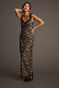 Black lace maxi dress with refined accents, a vacation maxi dress essential.