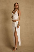 White maxi skirt with elegant accents, a white lace skirt essential.