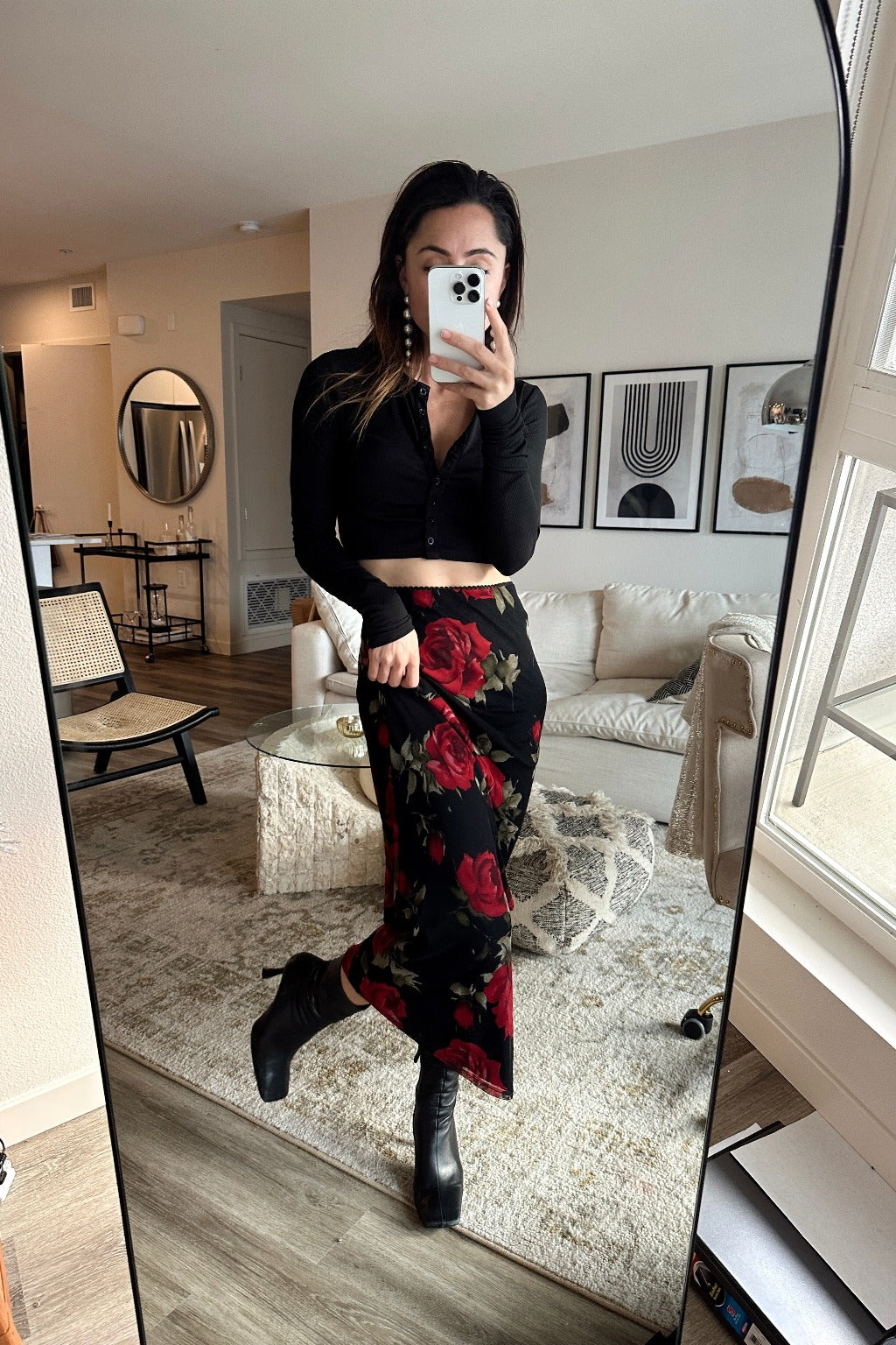 Lifestyle shot of the red maxi skirt styled for day-to-night versatility.