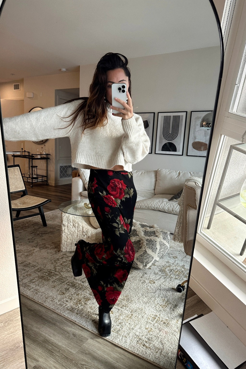 Full-length view of the red maxi skirt showing the drape and movement.