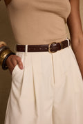 Brown belt with refined detailing and a flattering silhouette.