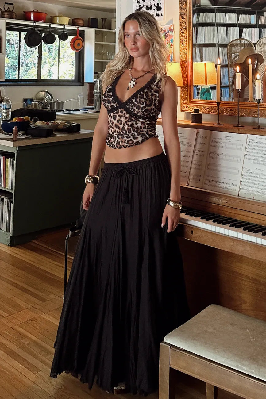 Close-up of the Violetta Black Gauze Maxi Skirt showcasing the fabric texture and design details.