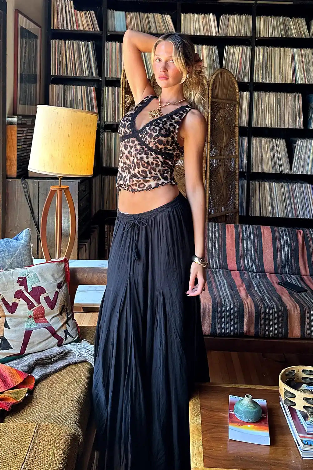 Back view of the black maxi skirt showing the silhouette and fit.