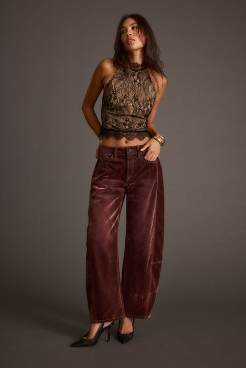 Back view of the black lace halter top showing the silhouette and fit.