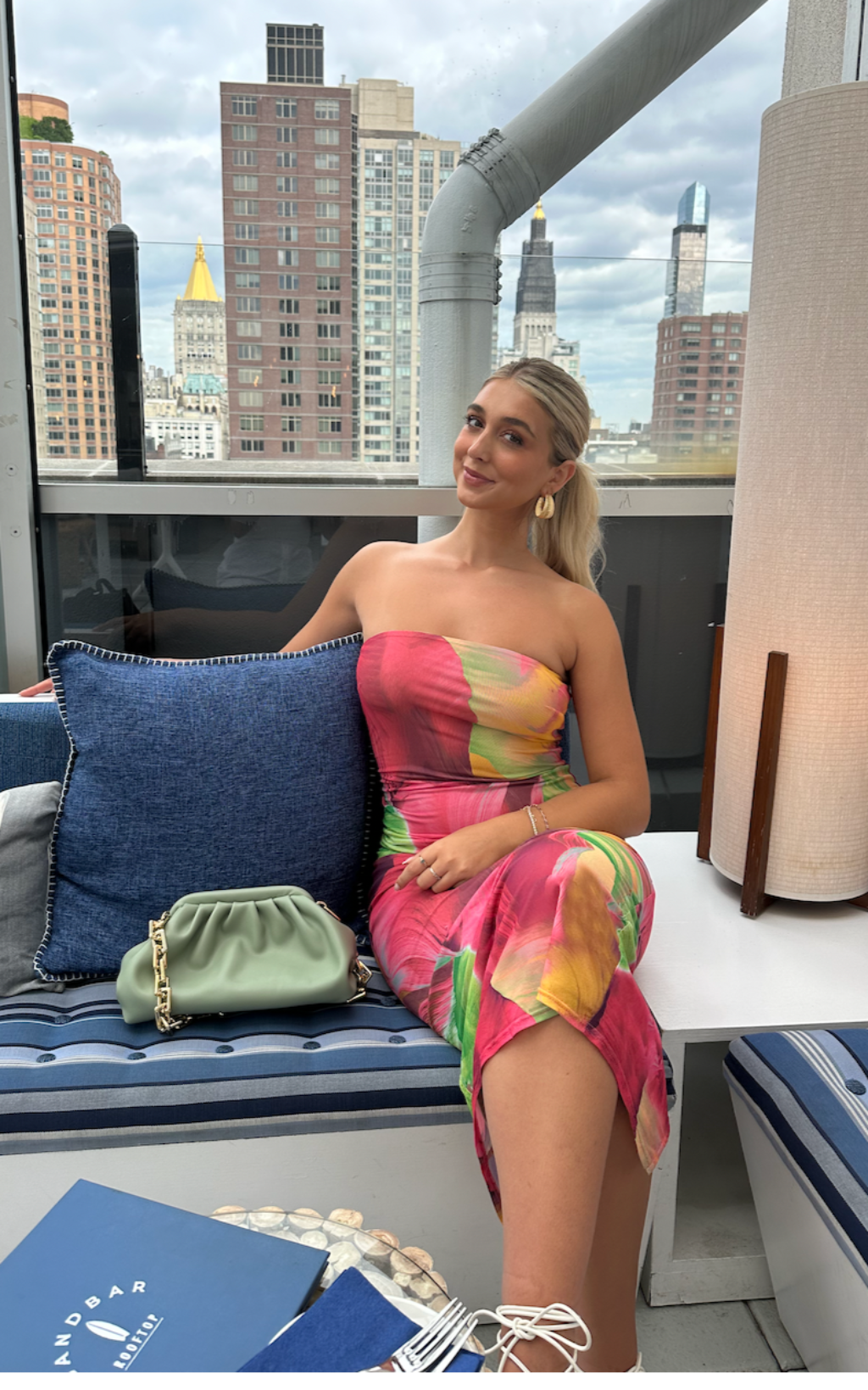 Lifestyle shot of the maxi dress styled for day-to-night versatility.