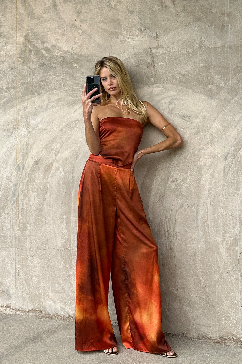 Full-length view of the pants showing the drape and movement.