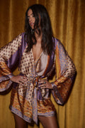 Gold dress with elegant accents, a gold fringe dress essential.