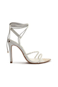 White lace heels with refined details and a polished finish.