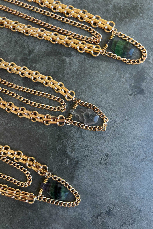 Emerson Necklace shown from a different angle, highlighting the metalwork details.