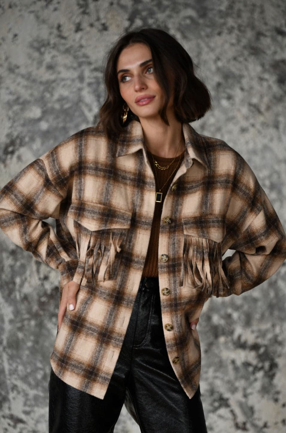 Devin Brown Fringe Shacket paired with complementary accessories for a polished look.